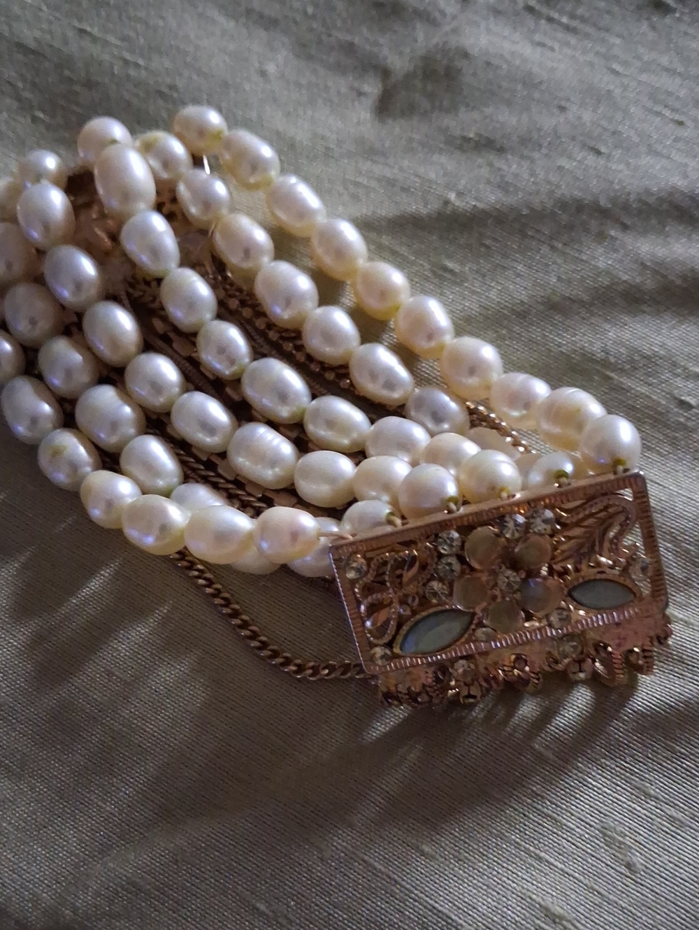 Multi-Strand White Pearl Bracelet with Rose Gold Filigree Clasp